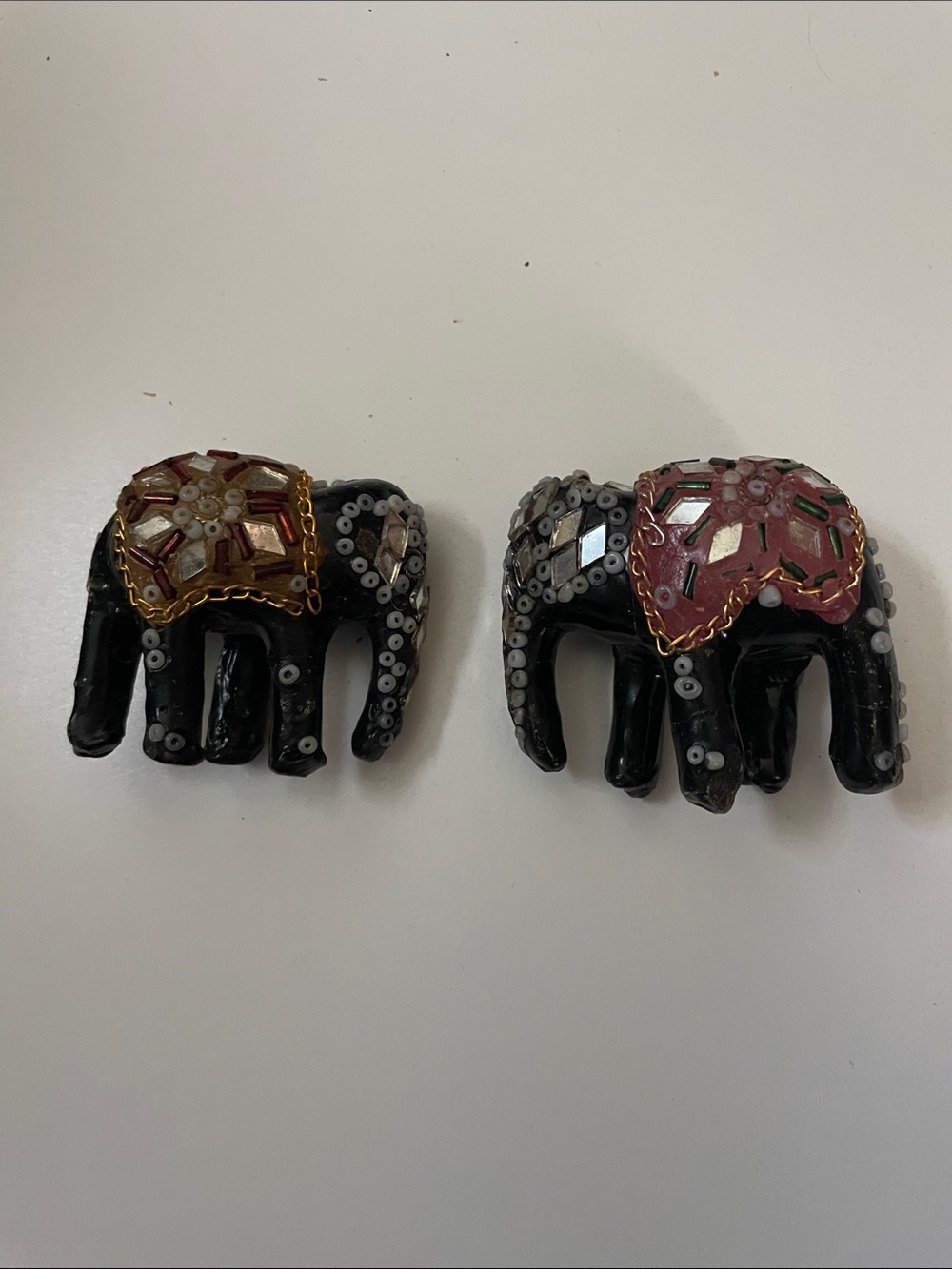 Handcrafted Black Elephant Accent Figurines with Beaded Red and Gold Saddles
